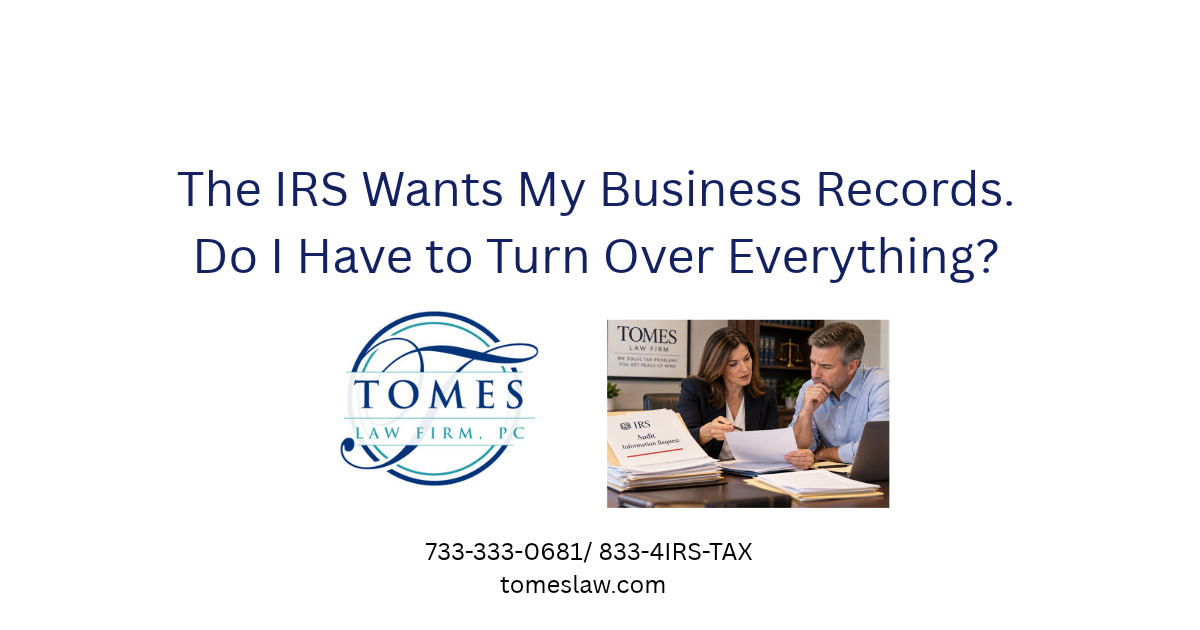 Tax attorney reviewing an IRS audit information request with a New Jersey business owner.