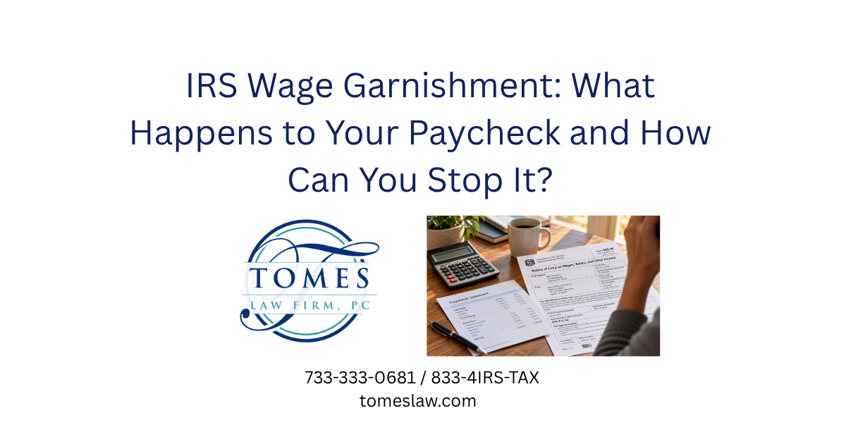 Pay stub showing a large IRS wage levy beside a calculator and pen on a wooden desk, illustrating the effect of IRS wage garnishment